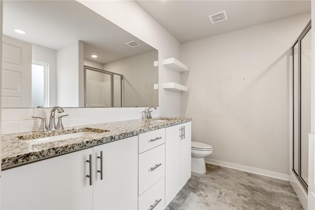 106 N Lion Dr, Gravette, AR 72736 - bathroom with a shower stall, double vanity, and recessed lighting
