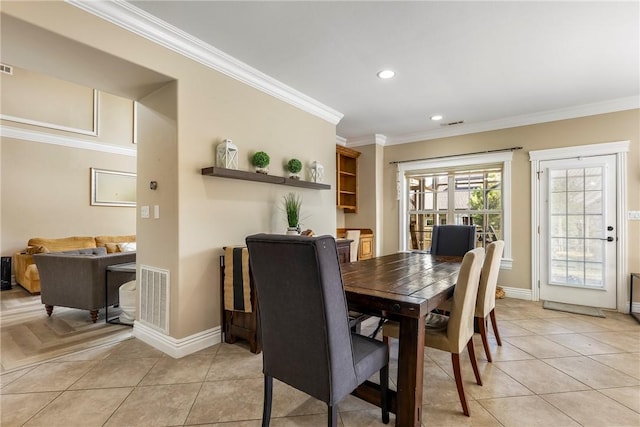 2301 SW Farringdon Ave, Bentonville, AR 72713 - dining room featuring crown molding, recessed lighting, and light tile patterned flooring