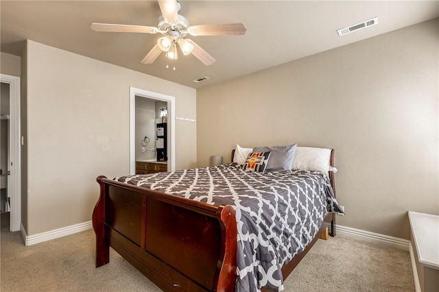 2301 SW Farringdon Ave, Bentonville, AR 72713 - carpeted bedroom with ceiling fan and ensuite bathroom