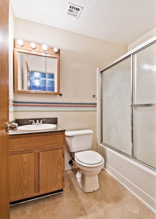 20724 E 578th Rd, Colcord, OK 74338 - full bathroom featuring vanity, bath / shower combo with glass door, and tile patterned floors