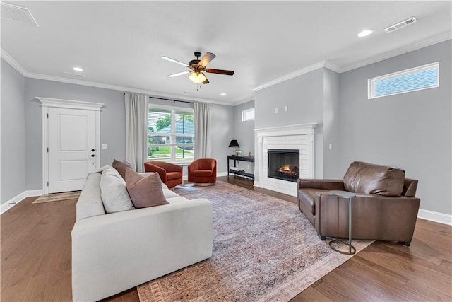 3205 Summer View Ave, Springdale, AR 72764 - living room featuring ceiling fan, wood finished floors, a fireplace, recessed lighting, and crown molding