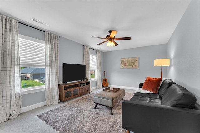 3205 Summer View Ave, Springdale, AR 72764 - carpeted living area with ceiling fan and baseboards