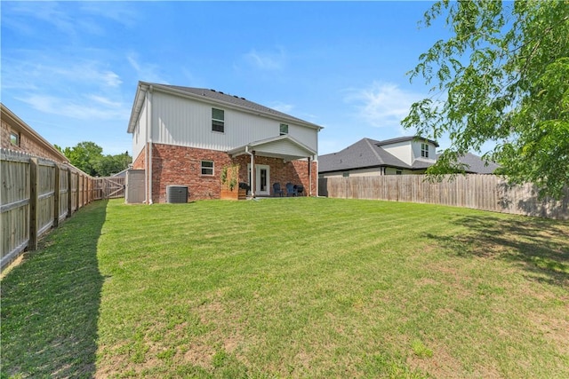 3205 Summer View Ave, Springdale, AR 72764 - rear view of house with brick siding and a fenced backyard