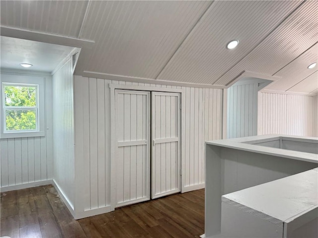 7792 Bubbling Springs Rd, Harrison, AR 72601 - bonus room with dark wood-type flooring and wood walls