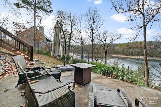 8715 Rambo N Rd, Rogers, AR 72756 - view of patio featuring a water view and stairs