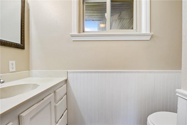 520 S 13th St, Rogers, AR 72758 - half bath with vanity and a wainscoted wall