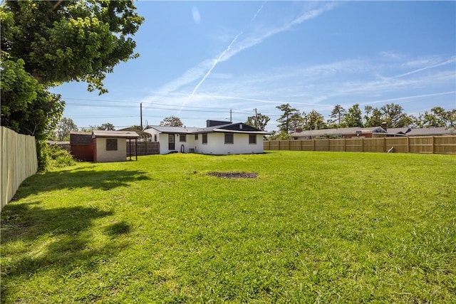 520 S 13th St, Rogers, AR 72758 - fenced backyard with a storage unit