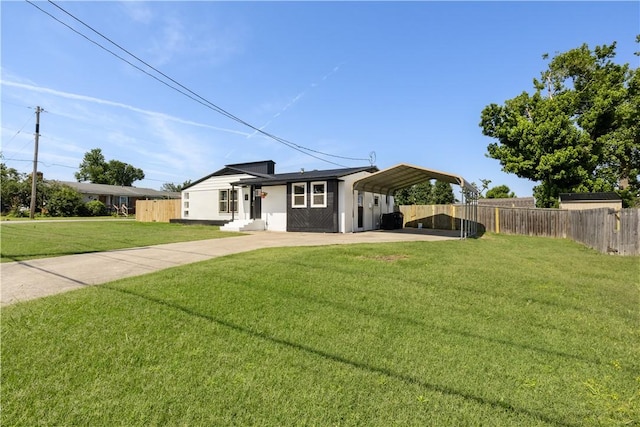 520 S 13th St, Rogers, AR 72758 - view of front facade with a carport and driveway