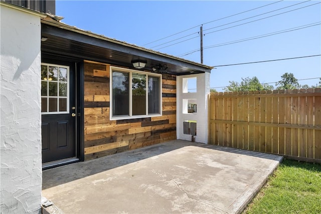 520 S 13th St, Rogers, AR 72758 - property entrance with a patio