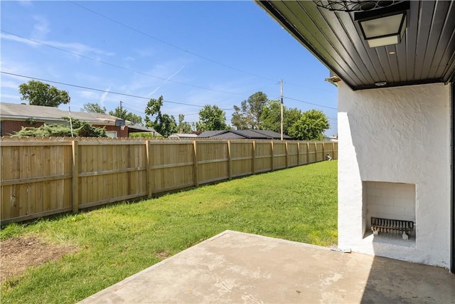 520 S 13th St, Rogers, AR 72758 - fenced backyard with a patio