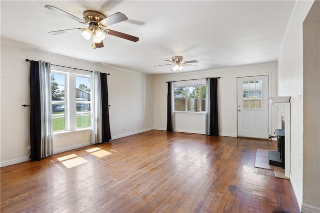 520 S 13th St, Rogers, AR 72758 - spare room featuring a ceiling fan and wood finished floors
