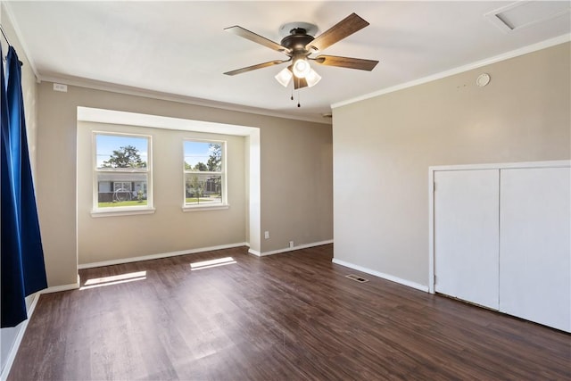 520 S 13th St, Rogers, AR 72758 - spare room with ornamental molding, ceiling fan, dark wood-style floors, and attic access