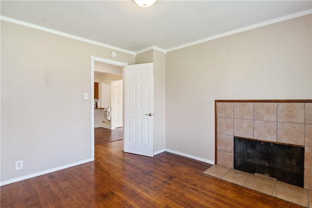 520 S 13th St, Rogers, AR 72758 - unfurnished living room featuring a fireplace, wood finished floors, and crown molding