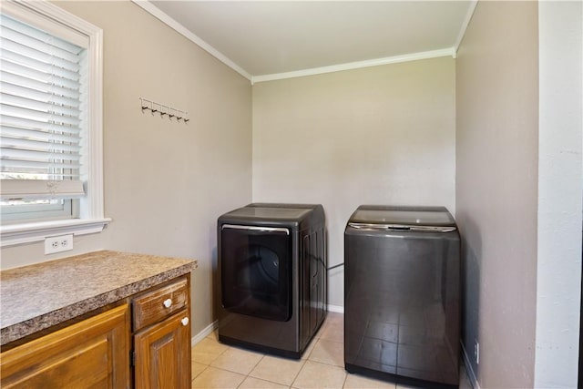 520 S 13th St, Rogers, AR 72758 - laundry room featuring washing machine and dryer, light tile patterned flooring, and ornamental molding