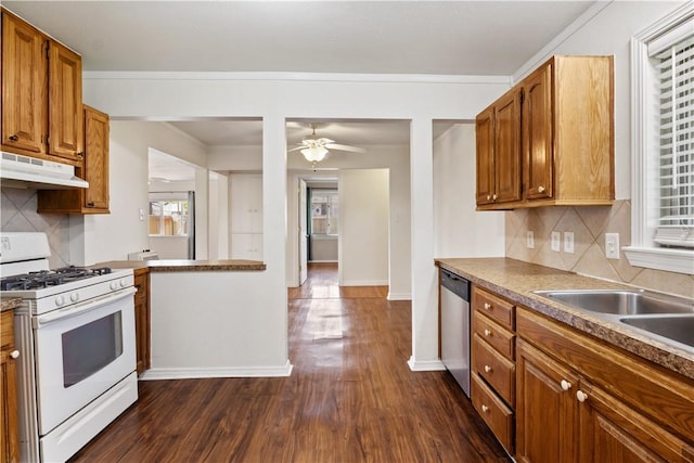 520 S 13th St, Rogers, AR 72758 - kitchen with gas range gas stove, under cabinet range hood, dishwasher, ceiling fan, and decorative backsplash