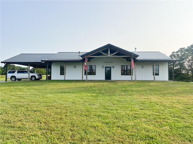 5807 Farm Rd Unit 2212, Washburn, MO 65772 - view of front of home with an attached carport, a front yard, and a metal roof