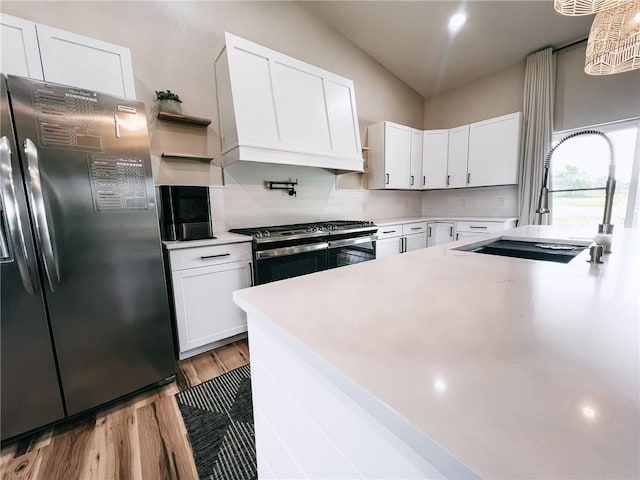 5807 Farm Rd Unit 2212, Washburn, MO 65772 - kitchen with fridge with ice dispenser, gas stove, light wood-style floors, open shelves, and light countertops