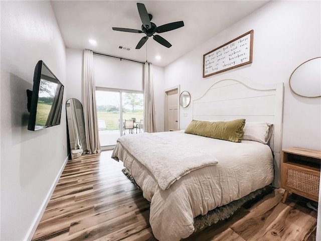 5807 Farm Rd Unit 2212, Washburn, MO 65772 - bedroom featuring access to outside, wood finished floors, recessed lighting, and a ceiling fan