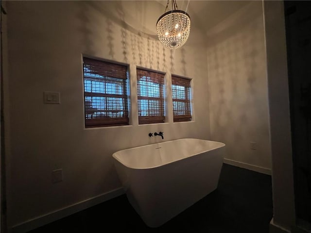 5807 Farm Rd Unit 2212, Washburn, MO 65772 - bathroom with a chandelier and a freestanding bath