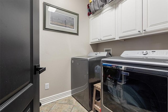 5208 43rd St, Rogers, AR 72758 - laundry room featuring washer and dryer and cabinet space