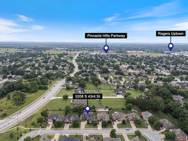 5208 43rd St, Rogers, AR 72758 - aerial overview of property's location with nearby suburban area