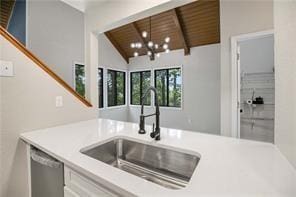 26 Norwood Dr, Bella Vista, AR 72714 - kitchen with wood ceiling, light countertops, dishwasher, and white cabinets