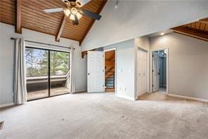 26 Norwood Dr, Bella Vista, AR 72714 - unfurnished living room with a wooden ceiling with exposed beams, carpet flooring, ceiling fan, and high vaulted ceiling