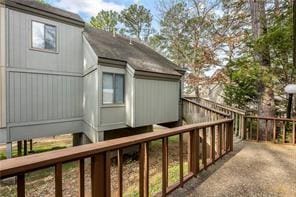 26 Norwood Dr, Bella Vista, AR 72714 - view of side of home featuring a wooden deck
