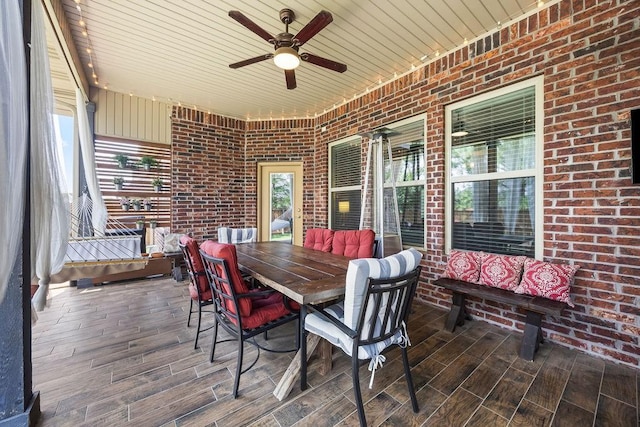4609 W Waters Edge Dr, Rogers, AR 72758 - deck featuring a ceiling fan and outdoor dining space