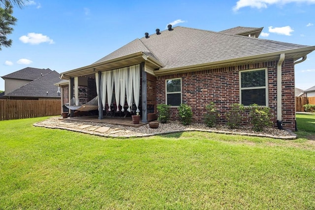 4609 W Waters Edge Dr, Rogers, AR 72758 - rear view of property featuring brick siding, a shingled roof, and a patio area