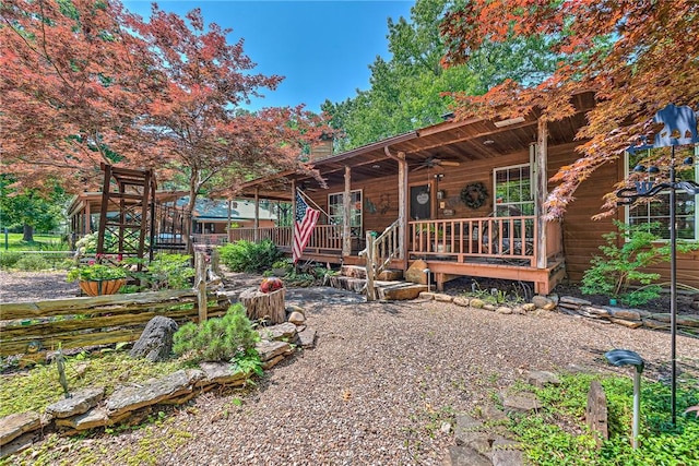 8092 Fain Dr, Rogers, AR 72756 - view of front of home with a ceiling fan and a deck