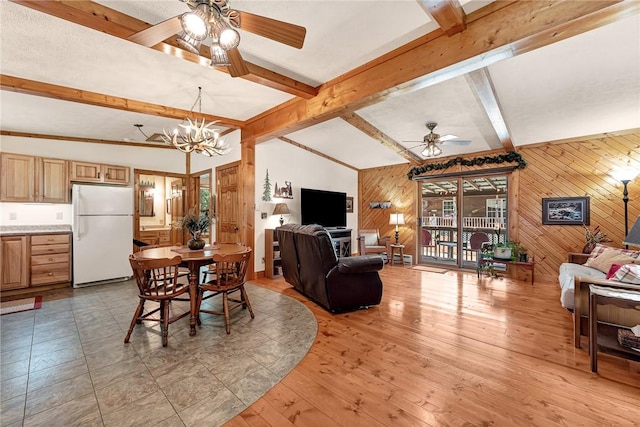 8092 Fain Dr, Rogers, AR 72756 - dining room with ceiling fan, wooden walls, and a chandelier