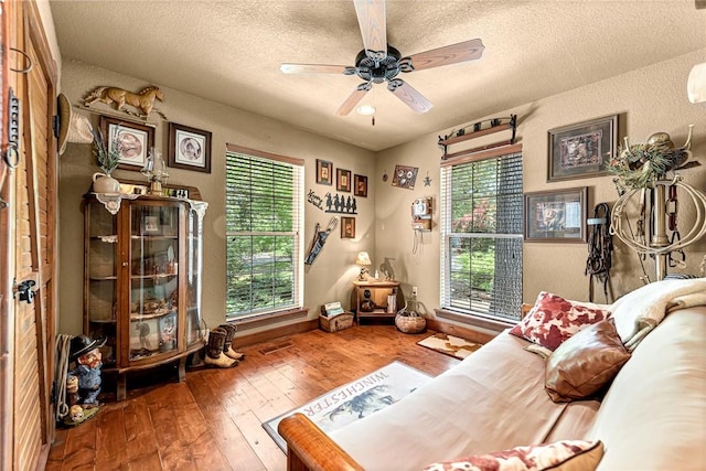 8092 Fain Dr, Rogers, AR 72756 - sitting room with a textured ceiling, wood-type flooring, ceiling fan, and a textured wall