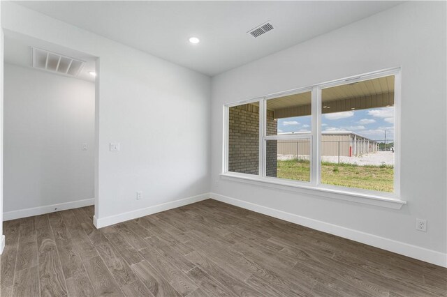 4669 W Triangle St, Fayetteville, AR 72704 - unfurnished room featuring wood finished floors and recessed lighting