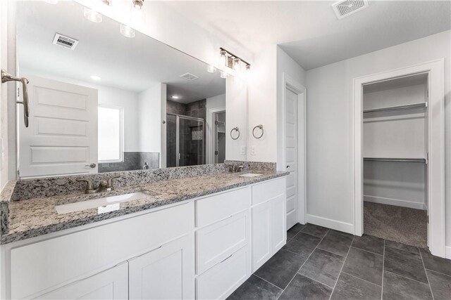 4669 W Triangle St, Fayetteville, AR 72704 - full bath with a stall shower, double vanity, and a spacious closet