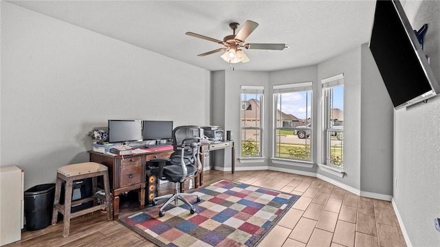 1705 Tull Dr, Pea Ridge, AR 72751 - office area featuring plenty of natural light, wood finished floors, and ceiling fan