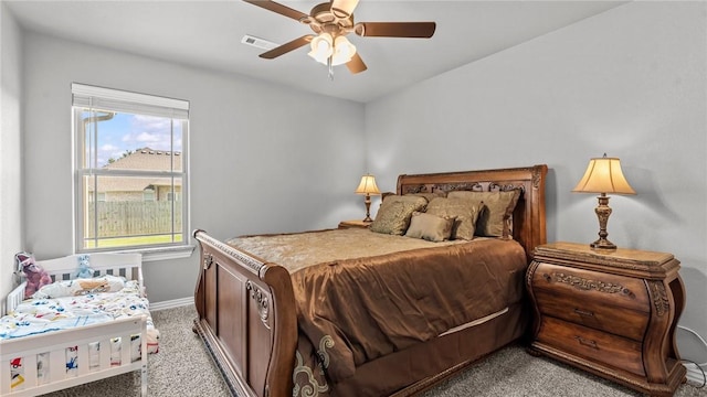 1705 Tull Dr, Pea Ridge, AR 72751 - bedroom featuring light carpet and a ceiling fan