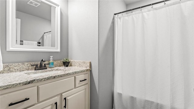 1705 Tull Dr, Pea Ridge, AR 72751 - bathroom featuring vanity and a shower with shower curtain