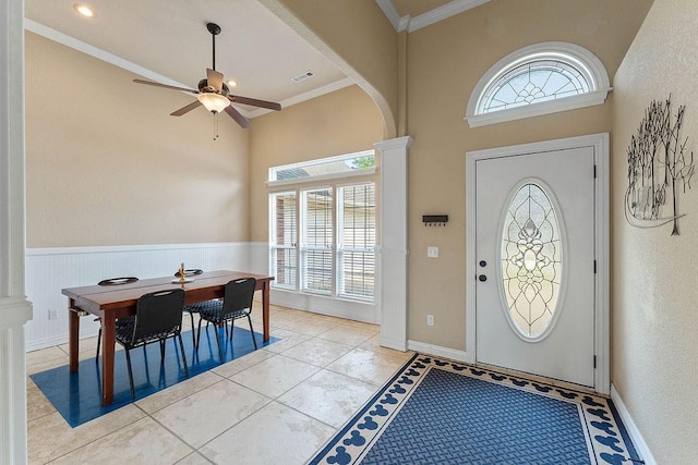 1315 S Breckenridge Loop, Rogers, AR 72756 - foyer entrance featuring plenty of natural light, ceiling fan, a towering ceiling, crown molding, and a wainscoted wall
