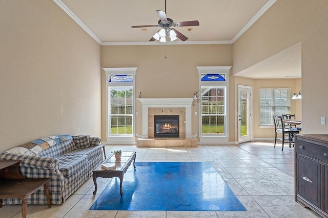 1315 S Breckenridge Loop, Rogers, AR 72756 - living room with a ceiling fan, ornamental molding, light tile patterned flooring, and a fireplace