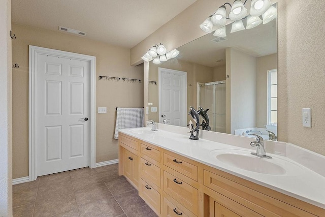1315 S Breckenridge Loop, Rogers, AR 72756 - bathroom featuring double vanity, a stall shower, and tile patterned floors