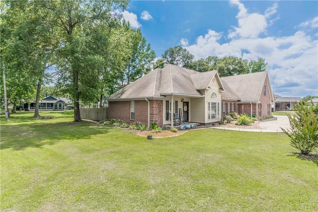 3 Jared Ln, Conway, AR 72032 - rear view of house featuring brick siding and roof with shingles