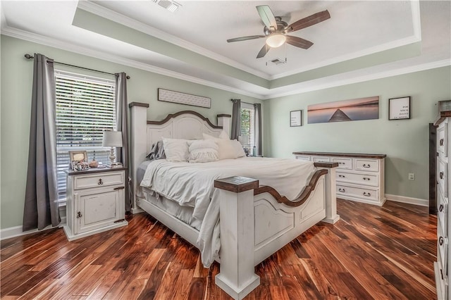 3 Jared Ln, Conway, AR 72032 - bedroom featuring a tray ceiling, dark wood-style flooring, crown molding, and ceiling fan