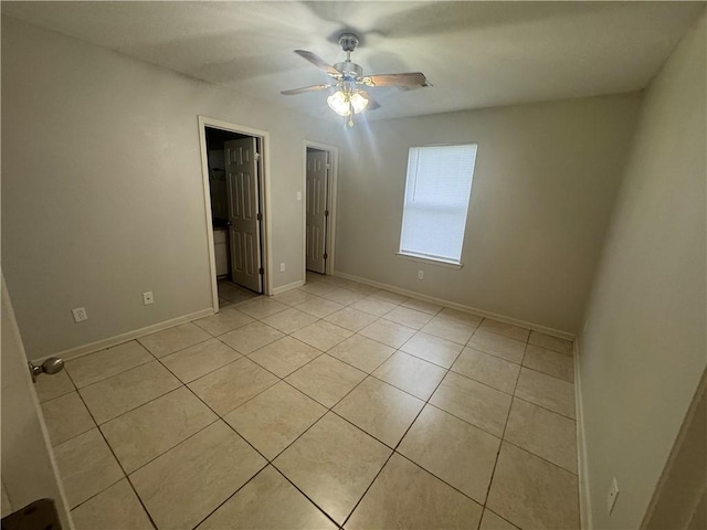 1010 Tori Ln, Beebe, AR 72012 - unfurnished bedroom with light tile patterned flooring and ceiling fan