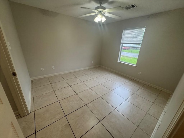 1010 Tori Ln, Beebe, AR 72012 - unfurnished room featuring a ceiling fan and light tile patterned flooring