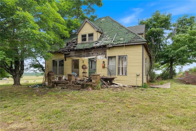 640 Madison Unit 4036, Huntsville, AR 72959 - rear view of property with a yard and a shingled roof