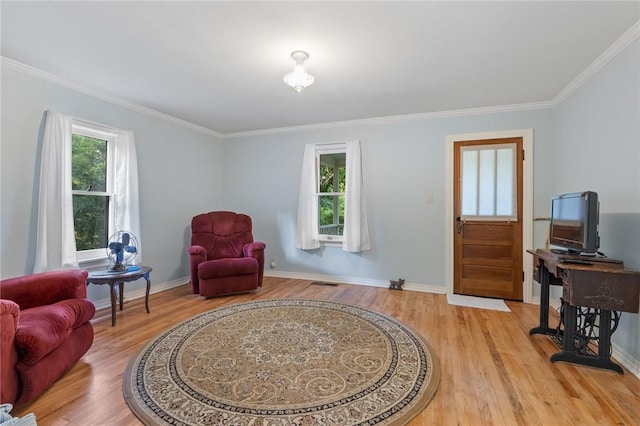 247 NC-3600, Western Grove, AR 72685 - sitting room featuring light wood-style flooring, plenty of natural light, and crown molding