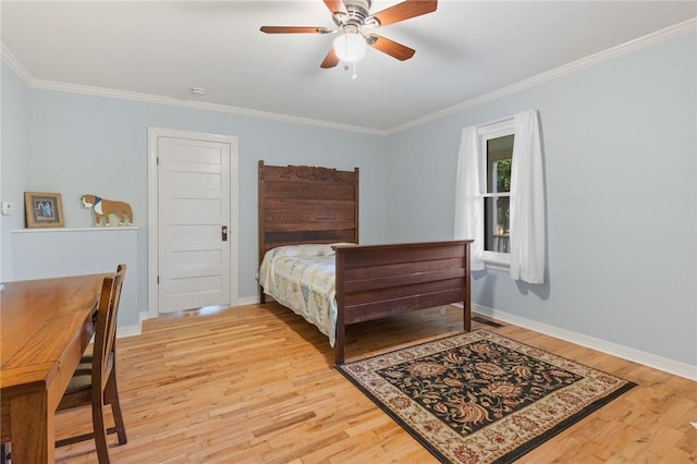 247 NC-3600, Western Grove, AR 72685 - bedroom with light wood-style floors, ornamental molding, and a ceiling fan