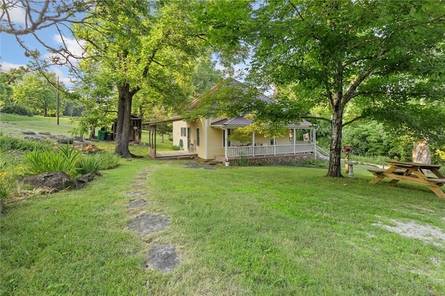 247 NC-3600, Western Grove, AR 72685 - view of grassy yard featuring covered porch