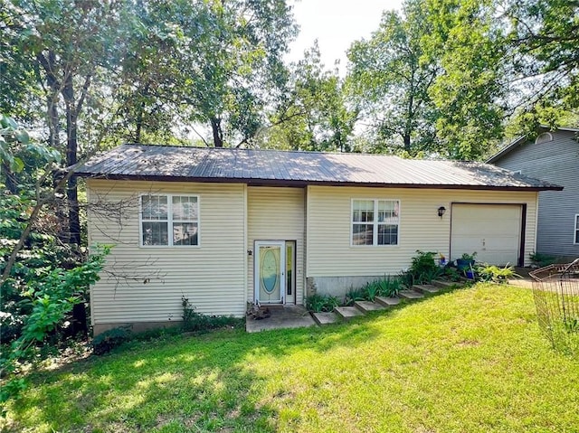 107 Jay Ln, Eureka Springs, AR 72632 - view of front of house featuring a garage, a front yard, and a metal roof